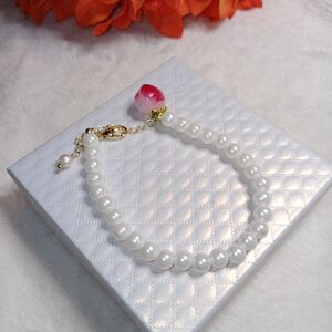 Elegant Pearl Bead Bracelet with Gold Accents And Peach Charm